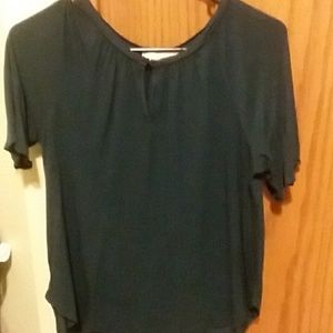 Dark blue tee shirt with button in front